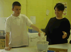Staff Showing student how to operate a mixer safely